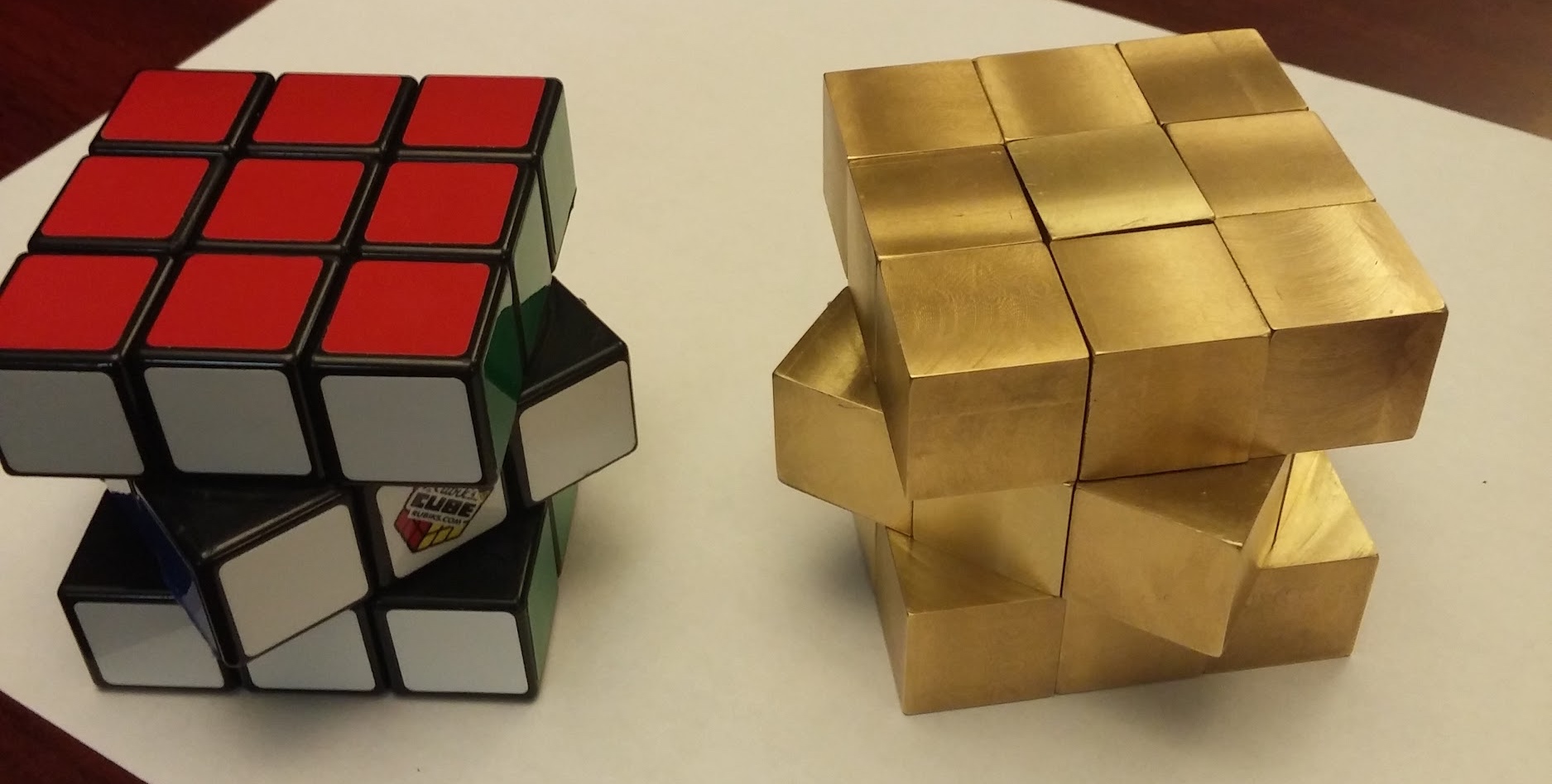 Machined Brass Cube vs Rubiks